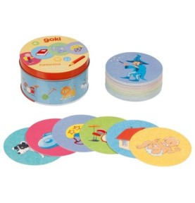 Jeu de mime Goki : boîte ronde en métal et cartes rondes illustrées étalées devant