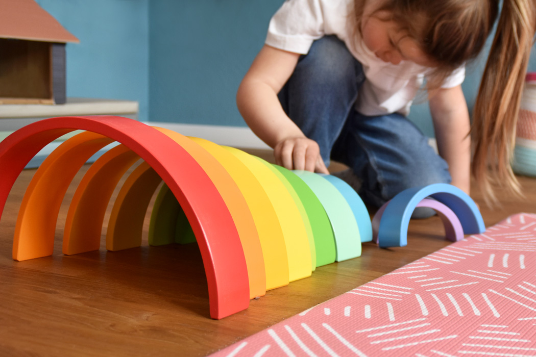 Giant Montessori wooden rainbow stacker with balls